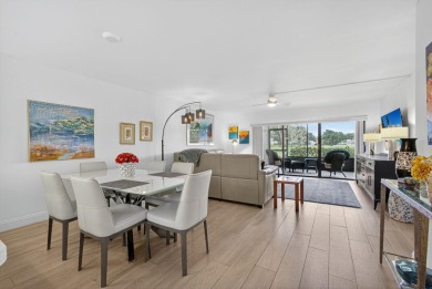 Rare opportunity to  purchase 1st floor, corner unit overlooking on Old Marsh Golf Club in Florida - for sale on GolfHomes.com, golf home, golf lot
