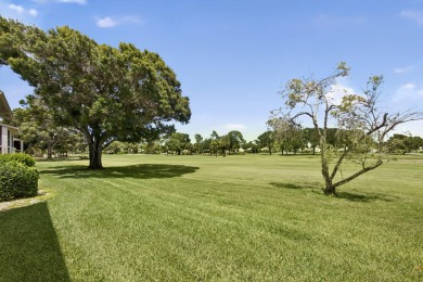 Rare opportunity to  purchase 1st floor, corner unit overlooking on Old Marsh Golf Club in Florida - for sale on GolfHomes.com, golf home, golf lot