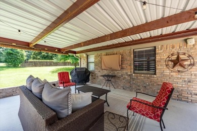 Absolutely stunning brick home in highly sought-after gated on Holly Lake Ranch Golf Club in Texas - for sale on GolfHomes.com, golf home, golf lot