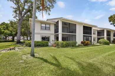 Rare opportunity to  purchase 1st floor, corner unit overlooking on Old Marsh Golf Club in Florida - for sale on GolfHomes.com, golf home, golf lot