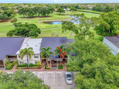 Rare opportunity to  purchase 1st floor, corner unit overlooking on Old Marsh Golf Club in Florida - for sale on GolfHomes.com, golf home, golf lot