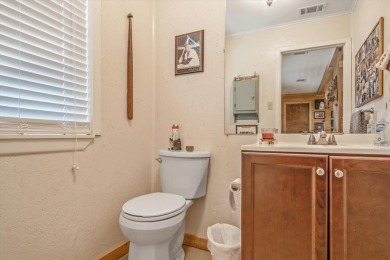 Absolutely stunning brick home in highly sought-after gated on Holly Lake Ranch Golf Club in Texas - for sale on GolfHomes.com, golf home, golf lot