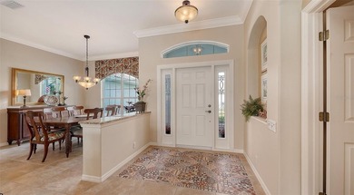 Welcome to this beautiful Siesta home with lake views, where on Pelican Pointe Golf and Country Club in Florida - for sale on GolfHomes.com, golf home, golf lot