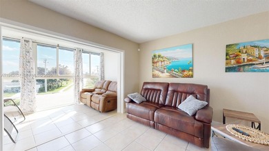 Beautifully renovated 2-bedroom, 2-bath condo located in a on Oriole Golf and Tennis Club in Florida - for sale on GolfHomes.com, golf home, golf lot