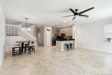 Beautifully maintained END-UNIT townhouse in a GATED community on Heritage Ridge Golf Club in Florida - for sale on GolfHomes.com, golf home, golf lot