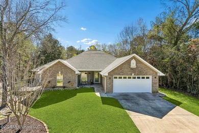 Situated on a spacious double lot in the desirable Diamondhead on Diamondhead Country Club in Mississippi - for sale on GolfHomes.com, golf home, golf lot