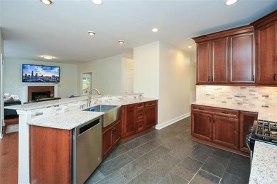 Discover this beautifully maintained home nestled in Eagle Watch on Canongate At Eagle Watch Golf Club in Georgia - for sale on GolfHomes.com, golf home, golf lot