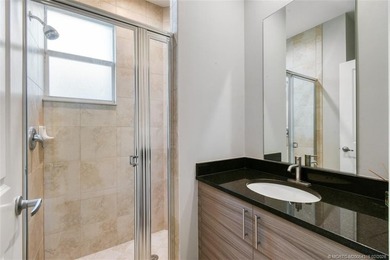 Beautifully maintained END-UNIT townhouse in a GATED community on Heritage Ridge Golf Club in Florida - for sale on GolfHomes.com, golf home, golf lot