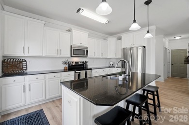 Beautifully updated and filled with natural light, this spacious on Tega Cay Golf Club in South Carolina - for sale on GolfHomes.com, golf home, golf lot