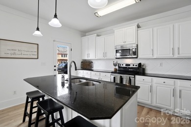 Beautifully updated and filled with natural light, this spacious on Tega Cay Golf Club in South Carolina - for sale on GolfHomes.com, golf home, golf lot