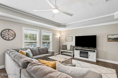 Situated on a spacious double lot in the desirable Diamondhead on Diamondhead Country Club in Mississippi - for sale on GolfHomes.com, golf home, golf lot