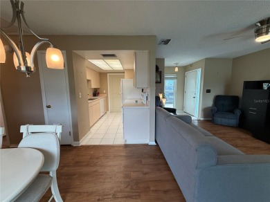Enjoy water views from every room!! Fully furnished 1BR/1.5BA on Highland Lakes Executive Golf Course in Florida - for sale on GolfHomes.com, golf home, golf lot
