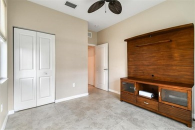 Beautifully maintained END-UNIT townhouse in a GATED community on Heritage Ridge Golf Club in Florida - for sale on GolfHomes.com, golf home, golf lot