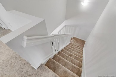 Beautifully maintained END-UNIT townhouse in a GATED community on Heritage Ridge Golf Club in Florida - for sale on GolfHomes.com, golf home, golf lot