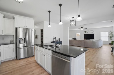 Beautifully updated and filled with natural light, this spacious on Tega Cay Golf Club in South Carolina - for sale on GolfHomes.com, golf home, golf lot