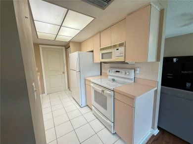 Enjoy water views from every room!! Fully furnished 1BR/1.5BA on Highland Lakes Executive Golf Course in Florida - for sale on GolfHomes.com, golf home, golf lot