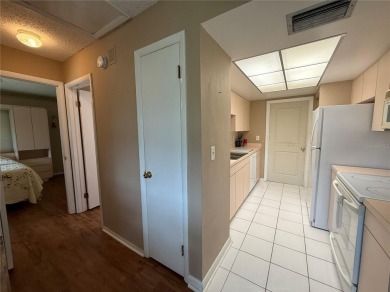 Enjoy water views from every room!! Fully furnished 1BR/1.5BA on Highland Lakes Executive Golf Course in Florida - for sale on GolfHomes.com, golf home, golf lot