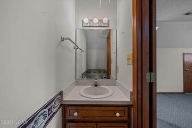 Discover this solidly built brick ranch perfectly situated on a on River Bend Golf and Country Club in North Carolina - for sale on GolfHomes.com, golf home, golf lot