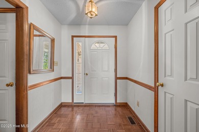 Discover this solidly built brick ranch perfectly situated on a on River Bend Golf and Country Club in North Carolina - for sale on GolfHomes.com, golf home, golf lot