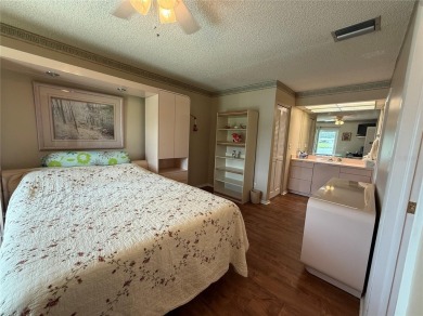 Enjoy water views from every room!! Fully furnished 1BR/1.5BA on Highland Lakes Executive Golf Course in Florida - for sale on GolfHomes.com, golf home, golf lot