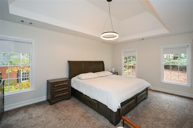 Discover this beautifully maintained home nestled in Eagle Watch on Canongate At Eagle Watch Golf Club in Georgia - for sale on GolfHomes.com, golf home, golf lot