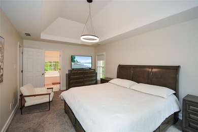 Discover this beautifully maintained home nestled in Eagle Watch on Canongate At Eagle Watch Golf Club in Georgia - for sale on GolfHomes.com, golf home, golf lot