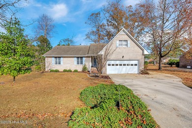 Discover this solidly built brick ranch perfectly situated on a on River Bend Golf and Country Club in North Carolina - for sale on GolfHomes.com, golf home, golf lot