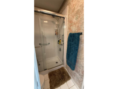 Enjoy water views from every room!! Fully furnished 1BR/1.5BA on Highland Lakes Executive Golf Course in Florida - for sale on GolfHomes.com, golf home, golf lot