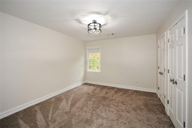 Discover this beautifully maintained home nestled in Eagle Watch on Canongate At Eagle Watch Golf Club in Georgia - for sale on GolfHomes.com, golf home, golf lot