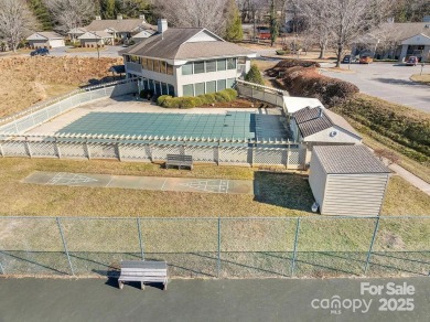 Welcome to effortless living in the sought-after Cloisters on Asheville Municipal Golf Course in North Carolina - for sale on GolfHomes.com, golf home, golf lot