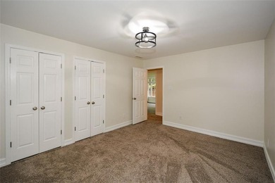 Discover this beautifully maintained home nestled in Eagle Watch on Canongate At Eagle Watch Golf Club in Georgia - for sale on GolfHomes.com, golf home, golf lot