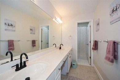 Discover this beautifully maintained home nestled in Eagle Watch on Canongate At Eagle Watch Golf Club in Georgia - for sale on GolfHomes.com, golf home, golf lot