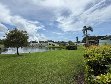 Enjoy water views from every room!! Fully furnished 1BR/1.5BA on Highland Lakes Executive Golf Course in Florida - for sale on GolfHomes.com, golf home, golf lot