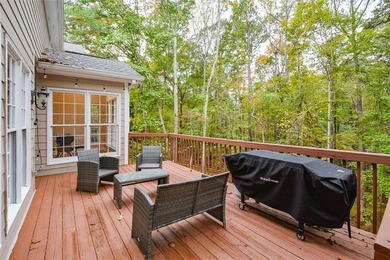 Discover this beautifully maintained home nestled in Eagle Watch on Canongate At Eagle Watch Golf Club in Georgia - for sale on GolfHomes.com, golf home, golf lot