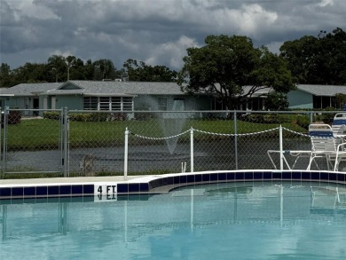 Enjoy water views from every room!! Fully furnished 1BR/1.5BA on Highland Lakes Executive Golf Course in Florida - for sale on GolfHomes.com, golf home, golf lot