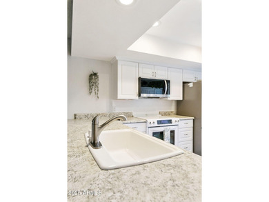 Welcome home to the highly sought-after 55+ community of on Fountain of the Sun Country Club in Arizona - for sale on GolfHomes.com, golf home, golf lot