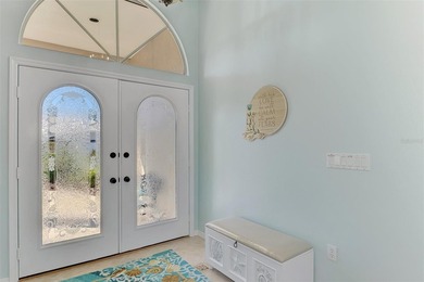 This truly stunning home offers soaring HIGH CEILINGS and on Waterford Golf Club in Florida - for sale on GolfHomes.com, golf home, golf lot