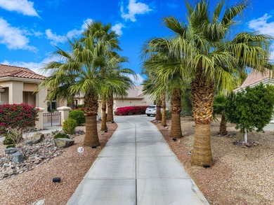Imagine waking each morning to sunlit fairways, shimmering water on Mountain Vista Golf Course At Sun City Palm Desert in California - for sale on GolfHomes.com, golf home, golf lot