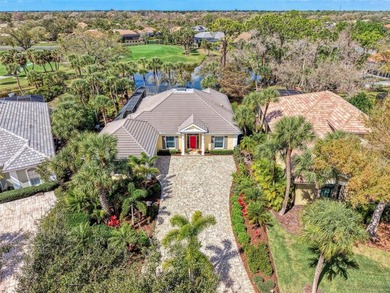 BEAUTIFUL HOME with POND and GOLF COURSE VIEWS! Situated on a on Boca Royale Golf and Country Club in Florida - for sale on GolfHomes.com, golf home, golf lot