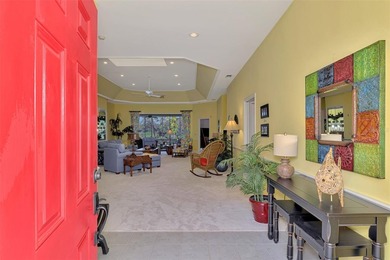 BEAUTIFUL HOME with POND and GOLF COURSE VIEWS! Situated on a on Boca Royale Golf and Country Club in Florida - for sale on GolfHomes.com, golf home, golf lot