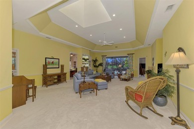BEAUTIFUL HOME with POND and GOLF COURSE VIEWS! Situated on a on Boca Royale Golf and Country Club in Florida - for sale on GolfHomes.com, golf home, golf lot