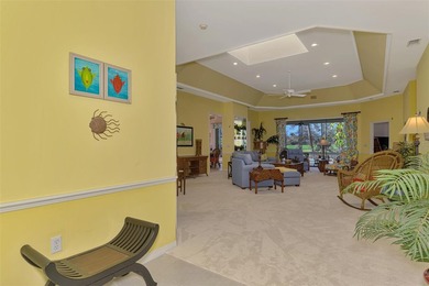 BEAUTIFUL HOME with POND and GOLF COURSE VIEWS! Situated on a on Boca Royale Golf and Country Club in Florida - for sale on GolfHomes.com, golf home, golf lot