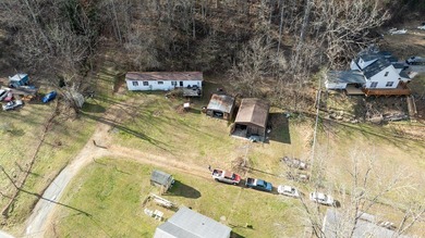 +9.7 unrestricted acres bordering Cherokee land and a on Smoky Mountain Country Club in North Carolina - for sale on GolfHomes.com, golf home, golf lot