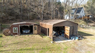 +9.7 unrestricted acres bordering Cherokee land and a on Smoky Mountain Country Club in North Carolina - for sale on GolfHomes.com, golf home, golf lot