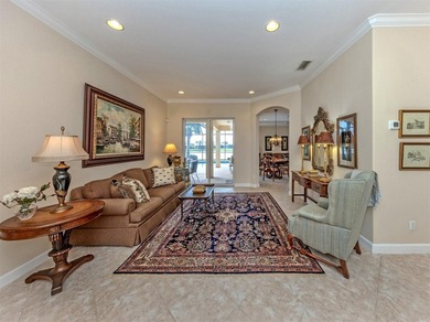 Welcome home to easy Florida living with peaceful lake views on Venetian Golf and River Club in Florida - for sale on GolfHomes.com, golf home, golf lot