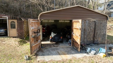 +9.7 unrestricted acres bordering Cherokee land and a on Smoky Mountain Country Club in North Carolina - for sale on GolfHomes.com, golf home, golf lot