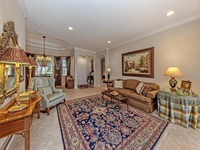 Welcome home to easy Florida living with peaceful lake views on Venetian Golf and River Club in Florida - for sale on GolfHomes.com, golf home, golf lot