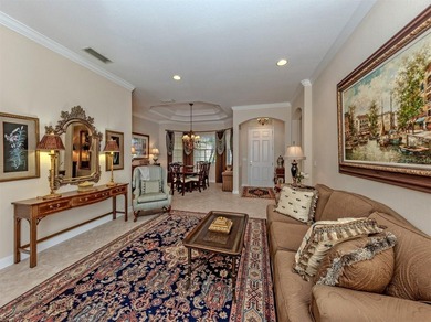 Welcome home to easy Florida living with peaceful lake views on Venetian Golf and River Club in Florida - for sale on GolfHomes.com, golf home, golf lot