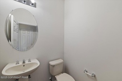 Step into sophistication with this beautifully designed End-Unit on Country Club of the Poconos Golf Course in Pennsylvania - for sale on GolfHomes.com, golf home, golf lot