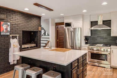 Welcome to this beautifully updated 4-bedroom, 4-bath home on Rumbling Bald Resort on Lake Lure in North Carolina - for sale on GolfHomes.com, golf home, golf lot